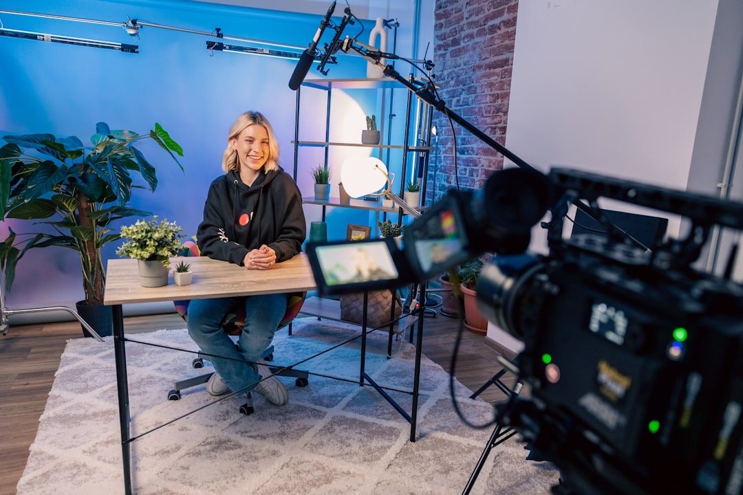 Instructors teaching a live broadcast production class in a real studio