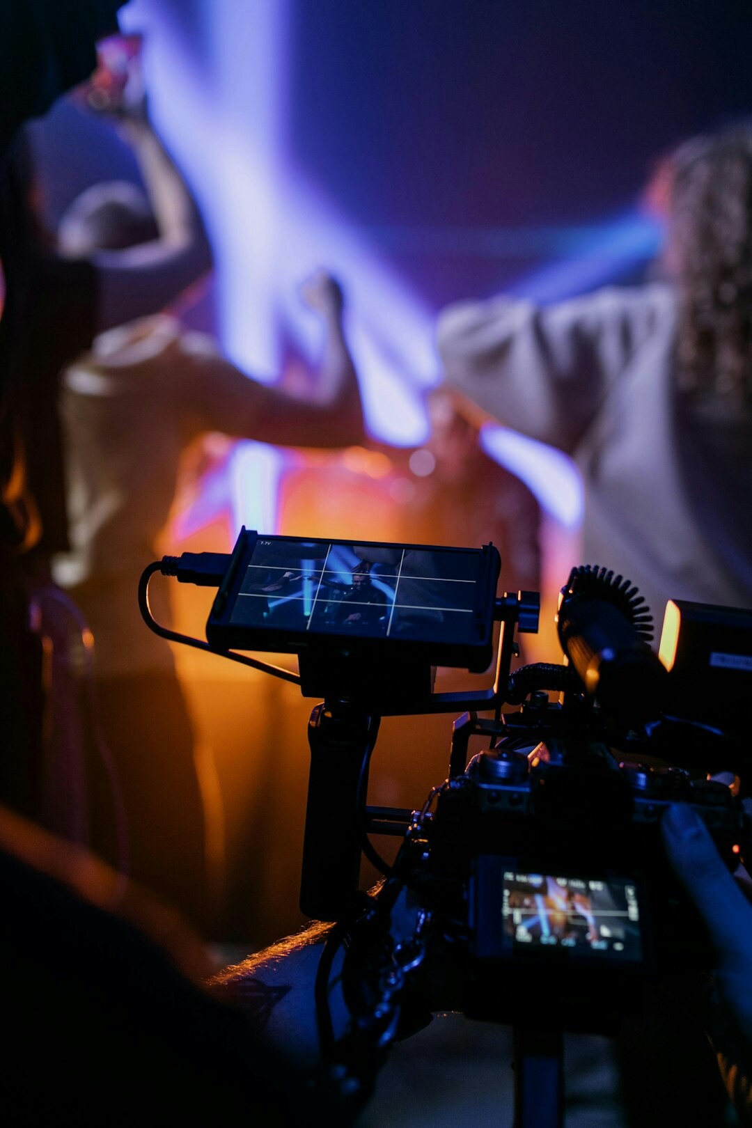 Finnish man reviewing a live broadcast schedule on a tablet in a studio